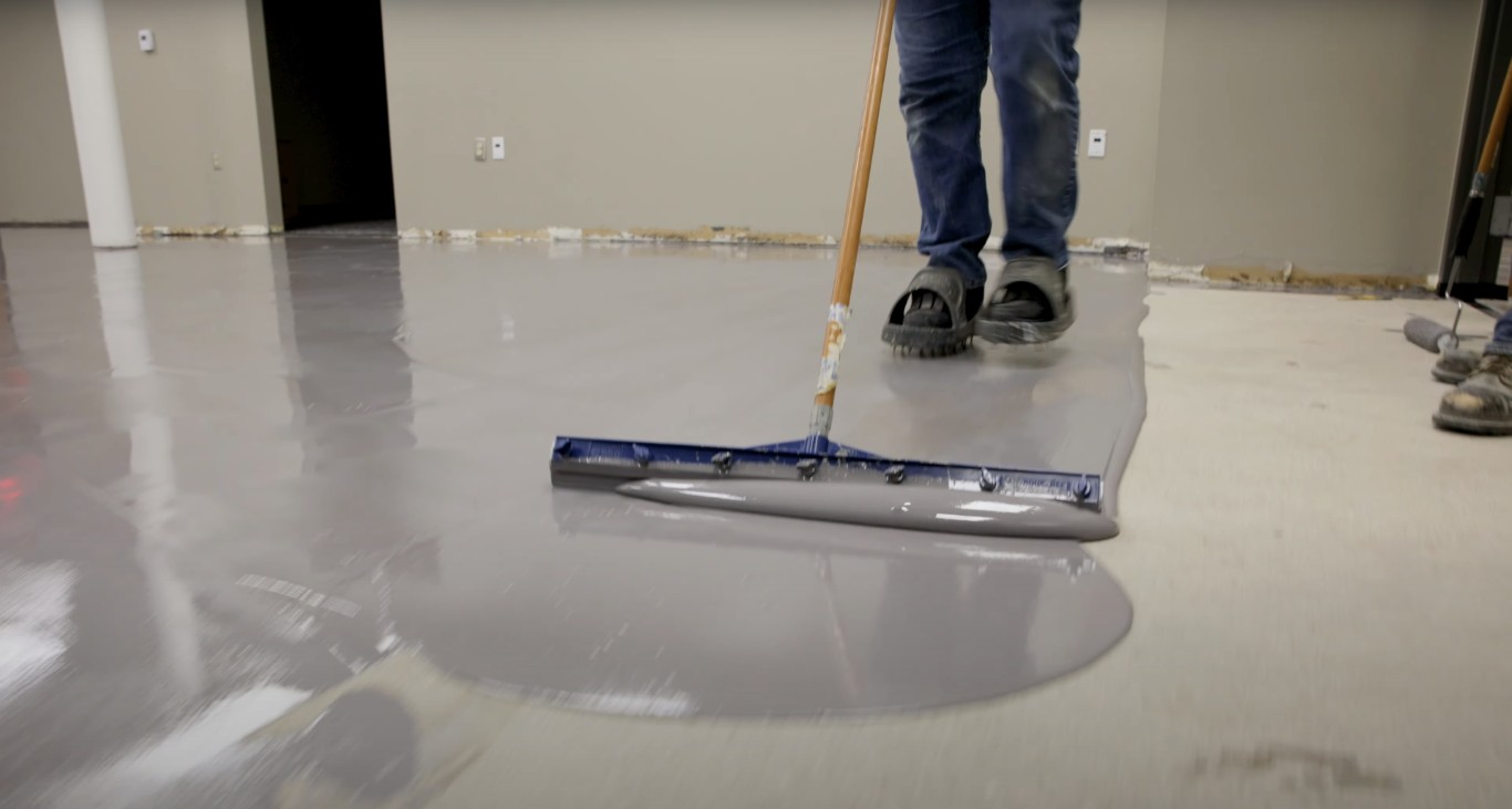 Professional applying concrete coating in Martinez